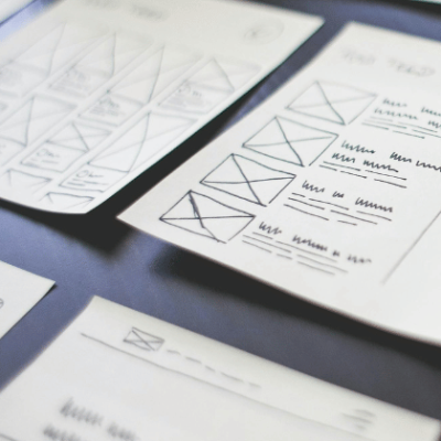 Hand drawn ux design wire frames on post it notes